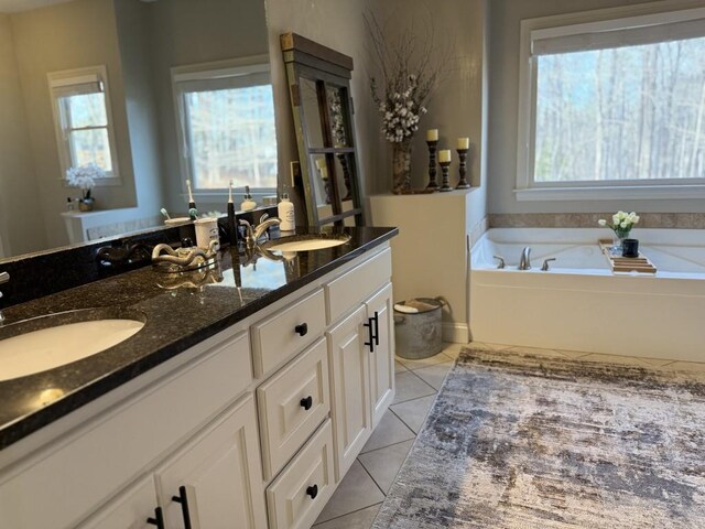 410 Spring Lake Hls, Canton, GA 30114 - bathroom featuring a sink, tile patterned flooring, and plenty of natural light