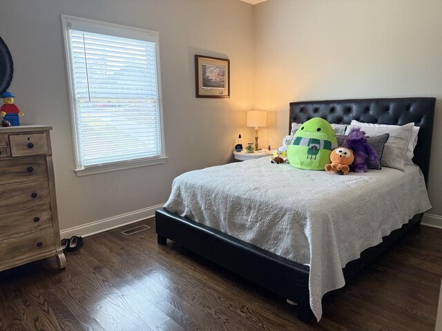 410 Spring Lake Hls, Canton, GA 30114 - bedroom with dark wood finished floors, baseboards, and visible vents
