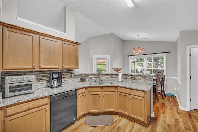 1164 Otis Dr, Bethlehem, GA 30620 - kitchen featuring dishwasher, lofted ceiling, a peninsula, light wood finished floors, and a chandelier