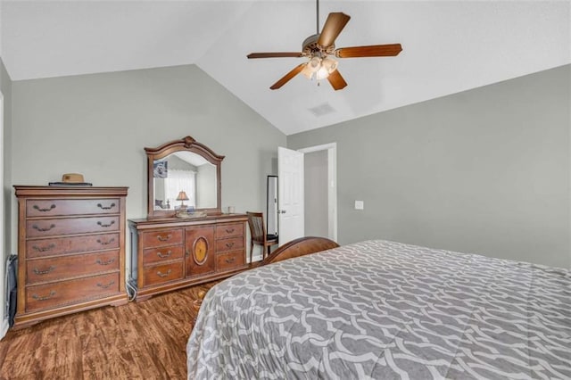 1164 Otis Dr, Bethlehem, GA 30620 - bedroom featuring wood finished floors, ceiling fan, and high vaulted ceiling