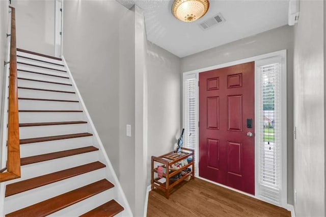 1164 Otis Dr, Bethlehem, GA 30620 - foyer with stairway and wood finished floors