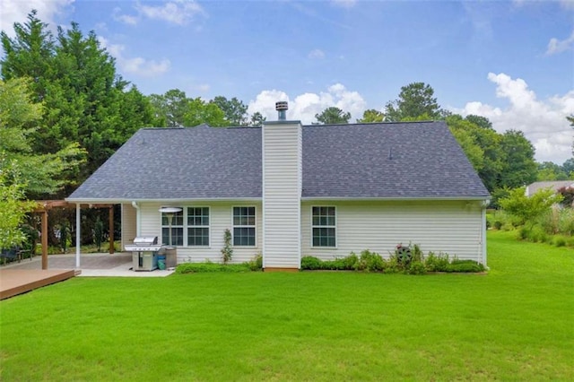 1164 Otis Dr, Bethlehem, GA 30620 - rear view of house with a lawn, a patio, a chimney, and a shingled roof