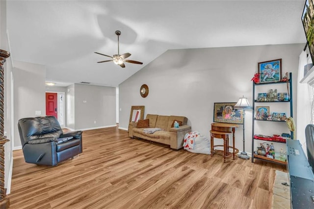 1164 Otis Dr, Bethlehem, GA 30620 - living room with wood finished floors, lofted ceiling, and ceiling fan
