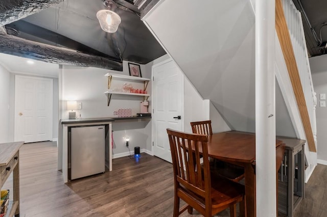 dining room featuring dark hardwood / wood-style flooring