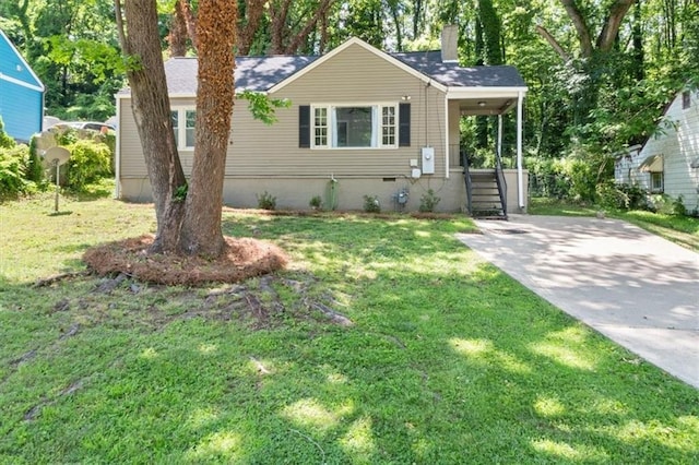 2923 Akron St, East Point, GA 30344 - view of front of property with a front lawn, a chimney, concrete driveway, and crawl space