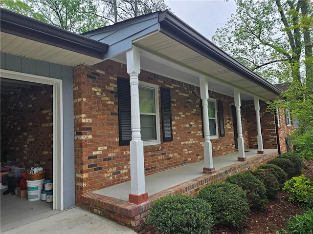 1089 Seven Springs Cir, Marietta, GA 30068 - view of home's exterior with board and batten siding, covered porch, and brick siding
