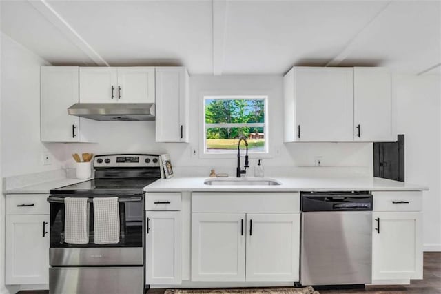 118 Buck Creek Cir, Griffin, GA 30224 - kitchen featuring stainless steel appliances, under cabinet range hood, white cabinetry, and light countertops