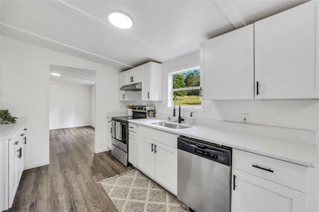 118 Buck Creek Cir, Griffin, GA 30224 - kitchen with appliances with stainless steel finishes, under cabinet range hood, wood finished floors, and white cabinets