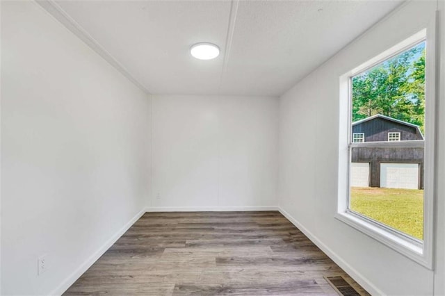 118 Buck Creek Cir, Griffin, GA 30224 - unfurnished room with wood finished floors and baseboards
