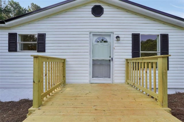 118 Buck Creek Cir, Griffin, GA 30224 - view of exterior entry with a wooden deck