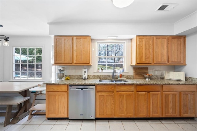 kitchen with dishwasher, a healthy amount of sunlight, visible vents, and a sink