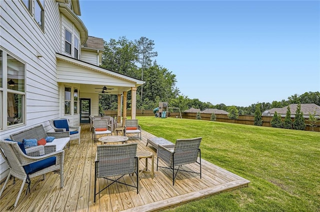 6168 Sweet Birch Ct, Acworth, GA 30101 - deck with an outdoor living space, a fenced backyard, a playground, and a ceiling fan
