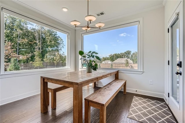 6168 Sweet Birch Ct, Acworth, GA 30101 - dining room featuring a chandelier, healthy amount of natural light, dark wood-style floors, crown molding, and recessed lighting