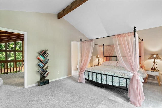 bedroom featuring lofted ceiling with beams and carpet floors