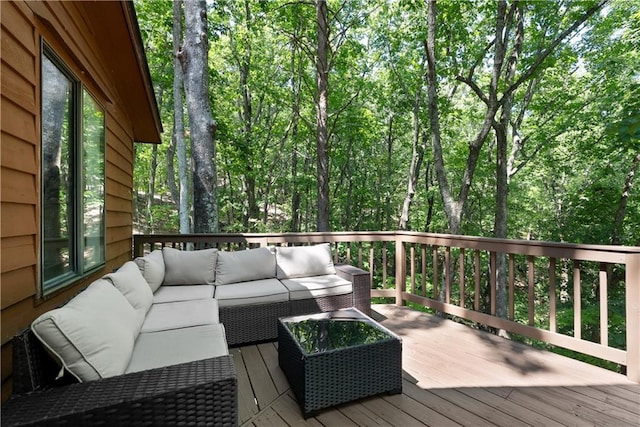 wooden deck featuring an outdoor living space