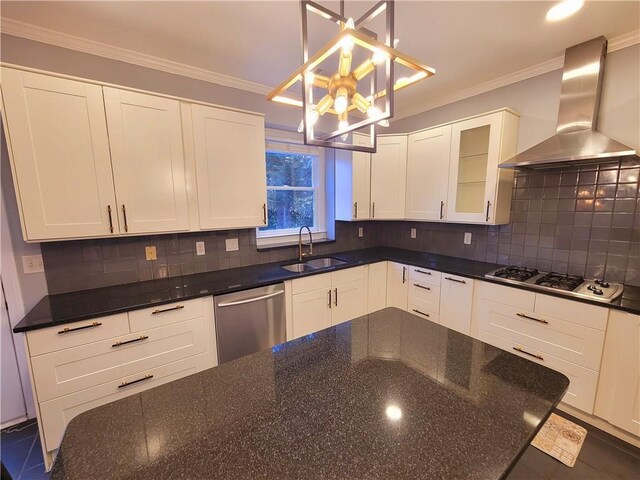 kitchen featuring a sink, ornamental molding, appliances with stainless steel finishes, wall chimney exhaust hood, and tasteful backsplash