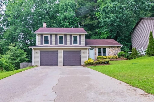 765 Martin Rd, Stone Mountain, GA 30088 - split level home with a chimney, driveway, a garage, and stone siding