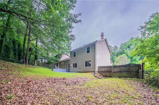 765 Martin Rd, Stone Mountain, GA 30088 - back of property with a chimney