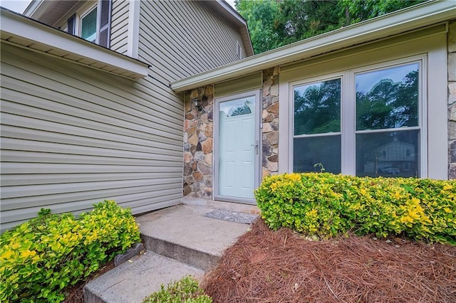765 Martin Rd, Stone Mountain, GA 30088 - doorway to property featuring stone siding
