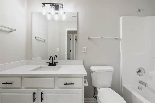full bathroom with toilet, vanity, and tub / shower combination