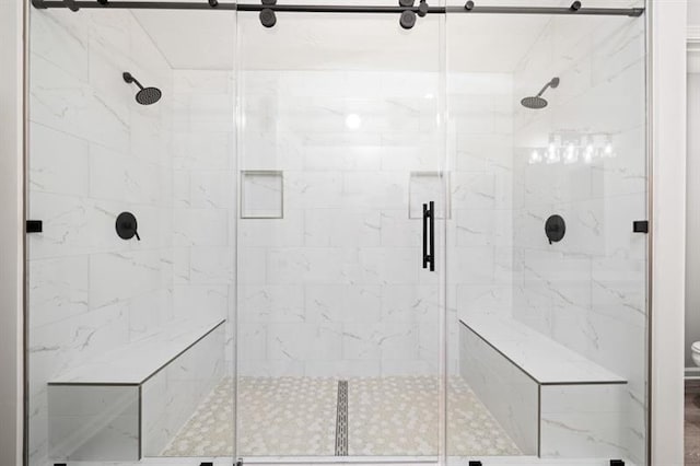 full bathroom featuring a stall shower