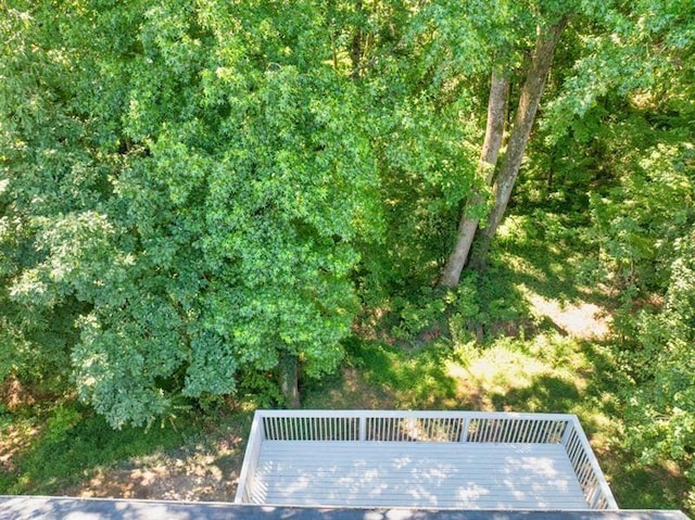 surrounding community featuring a deck