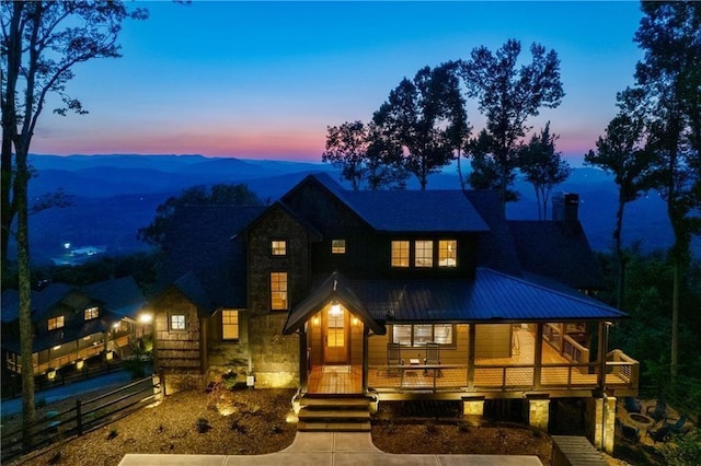 view of front of home featuring a mountain view