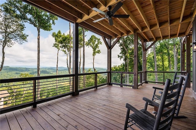 wooden terrace with ceiling fan