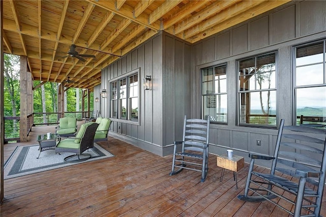 exterior space featuring ceiling fan