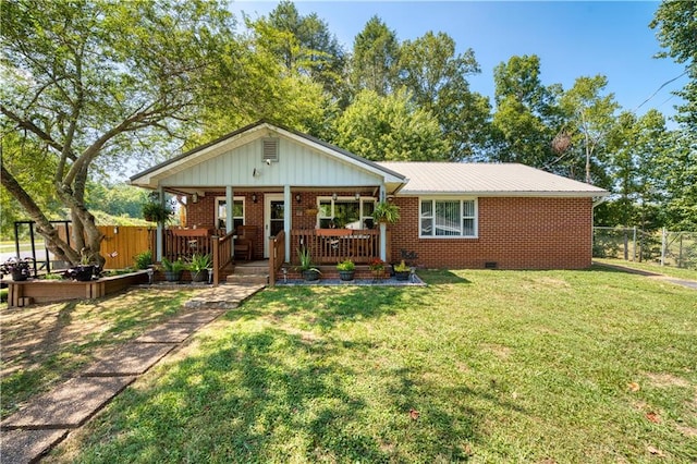 ranch-style home with a front lawn