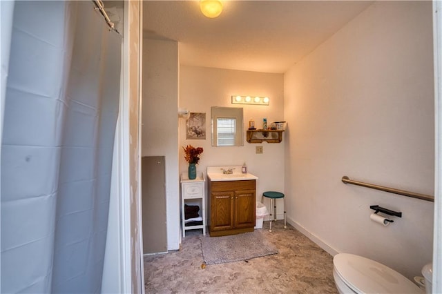 bathroom with vanity, toilet, and a shower with curtain