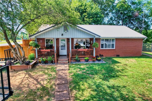 ranch-style house with a front lawn