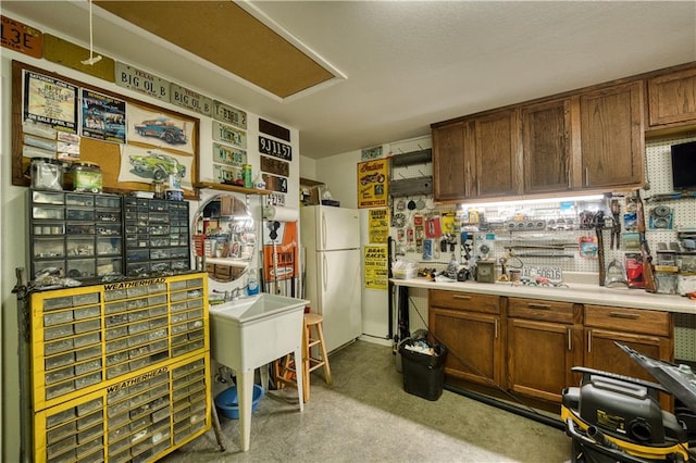 kitchen featuring white refrigerator