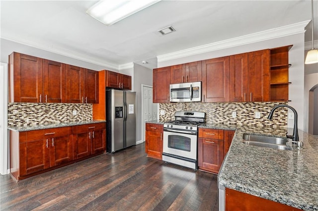 kitchen with visible vents, a sink, stone counters, stainless steel appliances, and open shelves