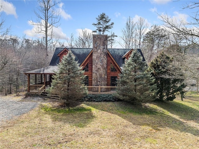 view of home's exterior with a yard