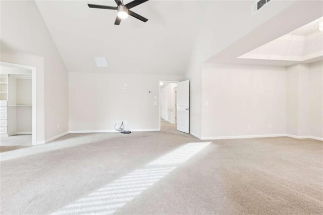 unfurnished living room featuring ceiling fan and light carpet