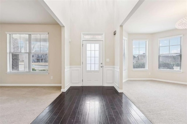 entrance foyer featuring dark hardwood / wood-style flooring