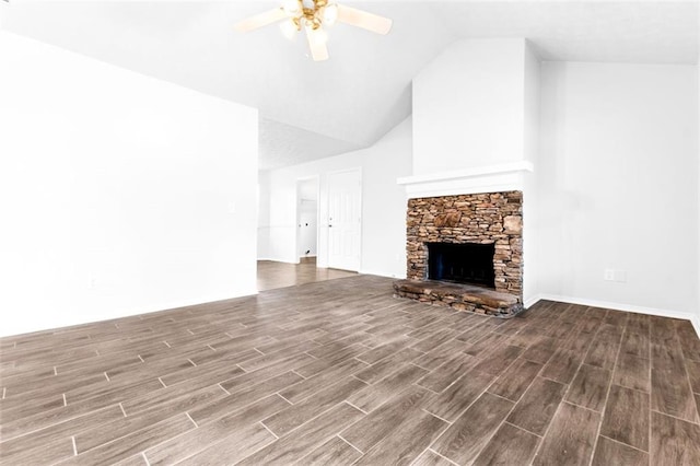 unfurnished living room featuring ceiling fan, high vaulted ceiling, and a fireplace