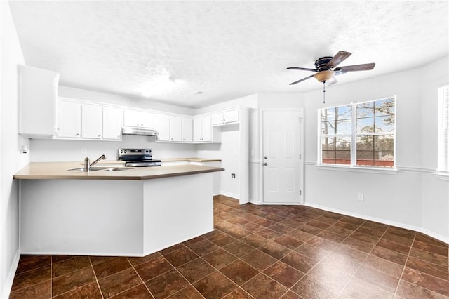 kitchen featuring sink, white cabinetry, a textured ceiling, electric range, and kitchen peninsula