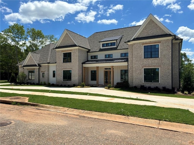 view of front of home with a front lawn
