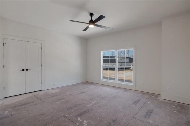empty room featuring ceiling fan