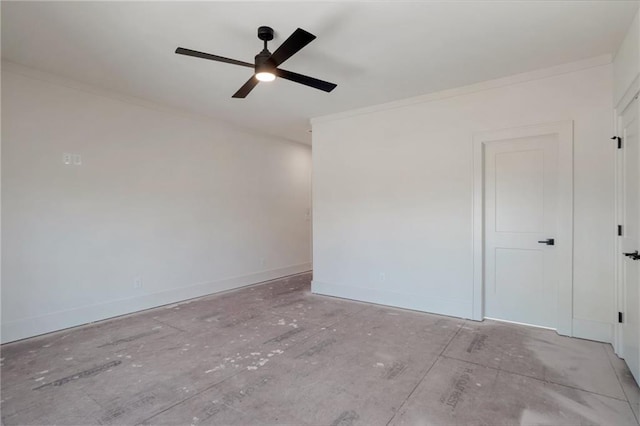 empty room featuring ornamental molding and ceiling fan