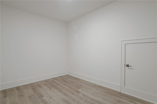 unfurnished room featuring light wood-type flooring