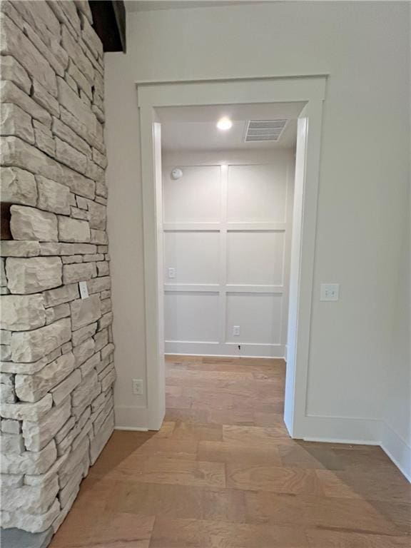 hall featuring hardwood / wood-style flooring