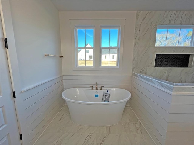 bathroom featuring a tub