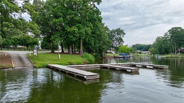 dock area featuring a water view