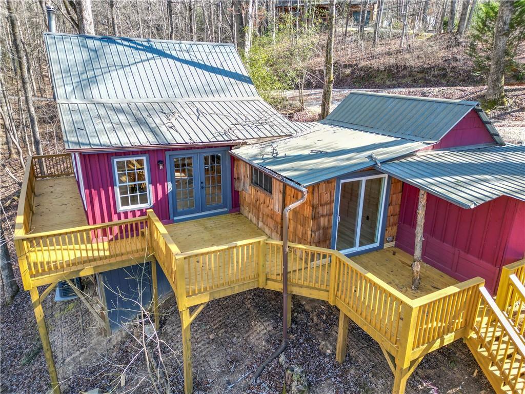 159 Rather Hill Trl, Clarkesville, GA 30523 - back of house featuring french doors, a wooden deck, stairway, metal roof, and board and batten siding