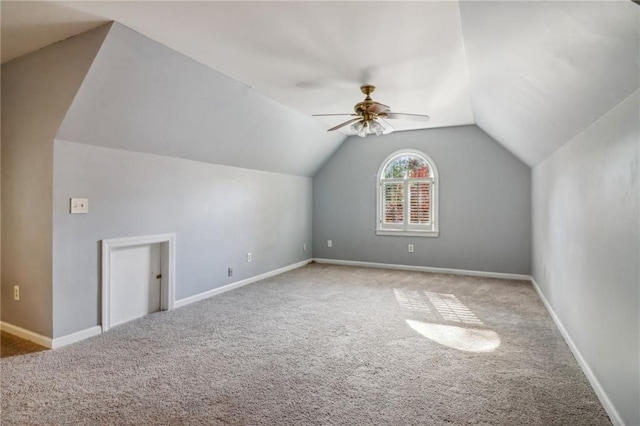 bonus room with carpet, vaulted ceiling, and ceiling fan