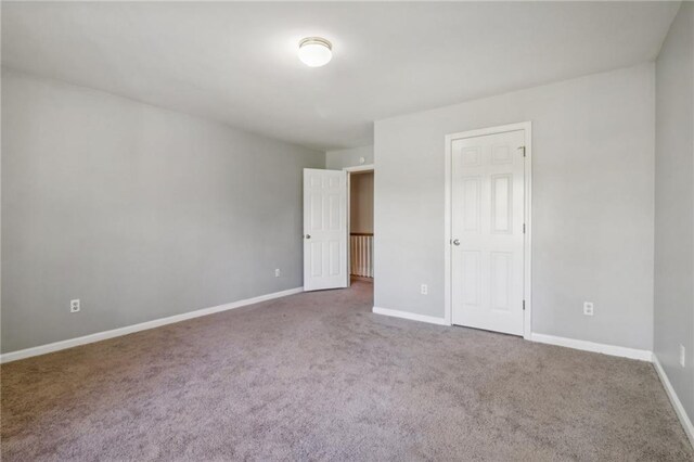 unfurnished bedroom featuring carpet flooring