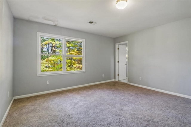 view of carpeted spare room